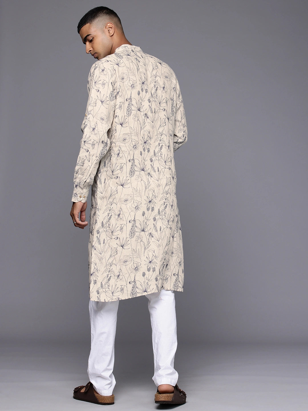 Model facing backwards wearing Natural Monochrome Veil Print Kurta by Brand Patrah