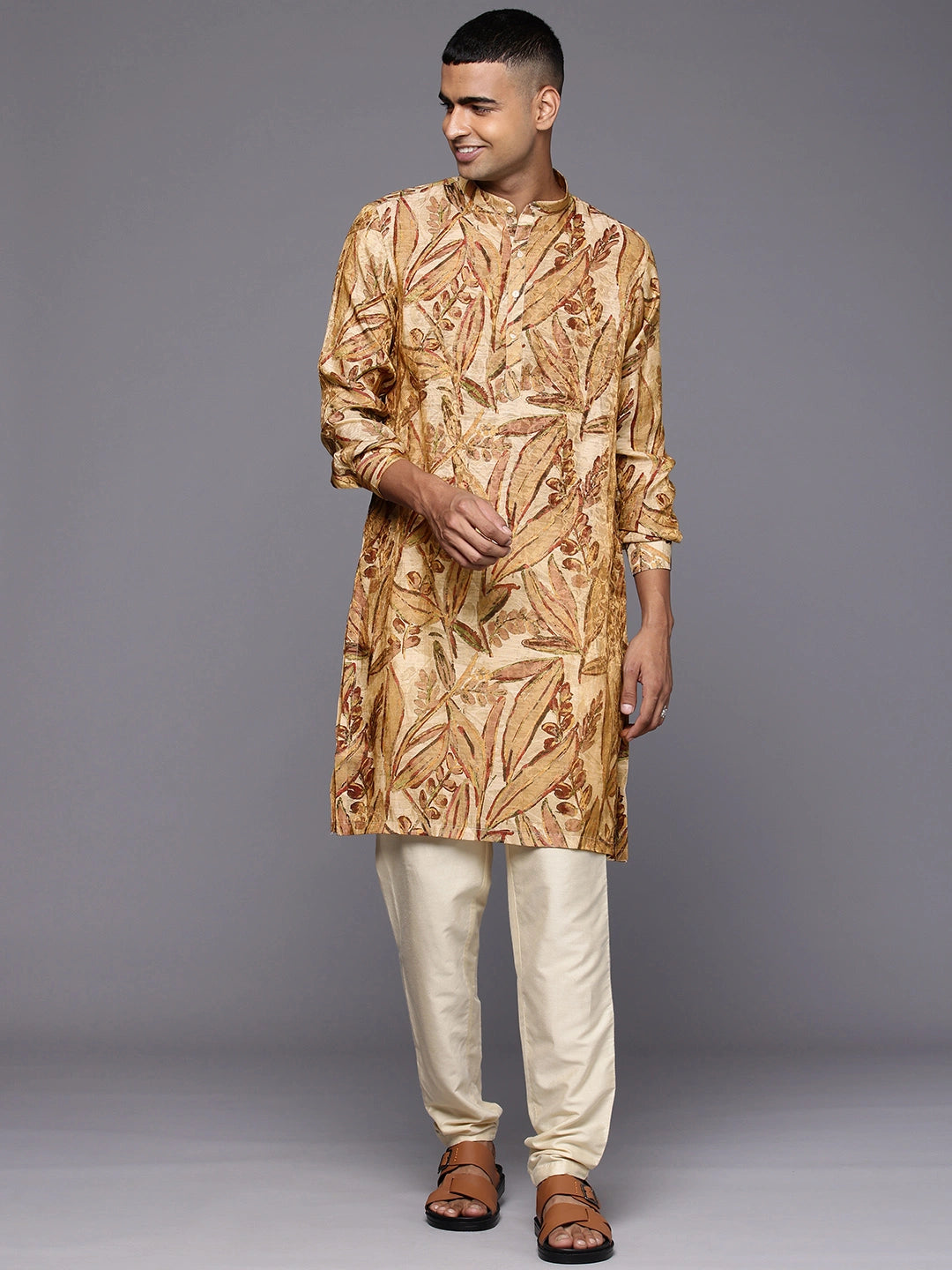 Model Looking sideways wearing Golden Maroon Abstract Floral Print Silk Kurta by Brand Patrah