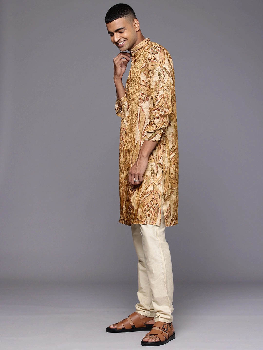 Model Looking sideways wearing Golden Maroon Abstract Floral Print Silk Kurta by Brand Patrah