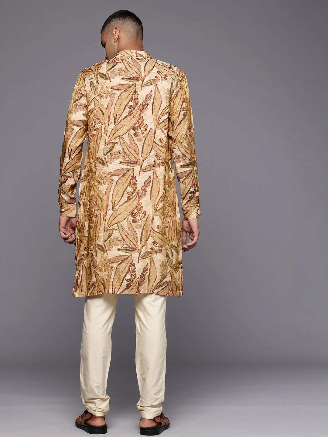 Model facing backwards wearing Golden Maroon Abstract Floral Print Silk Kurta by Brand Patrah