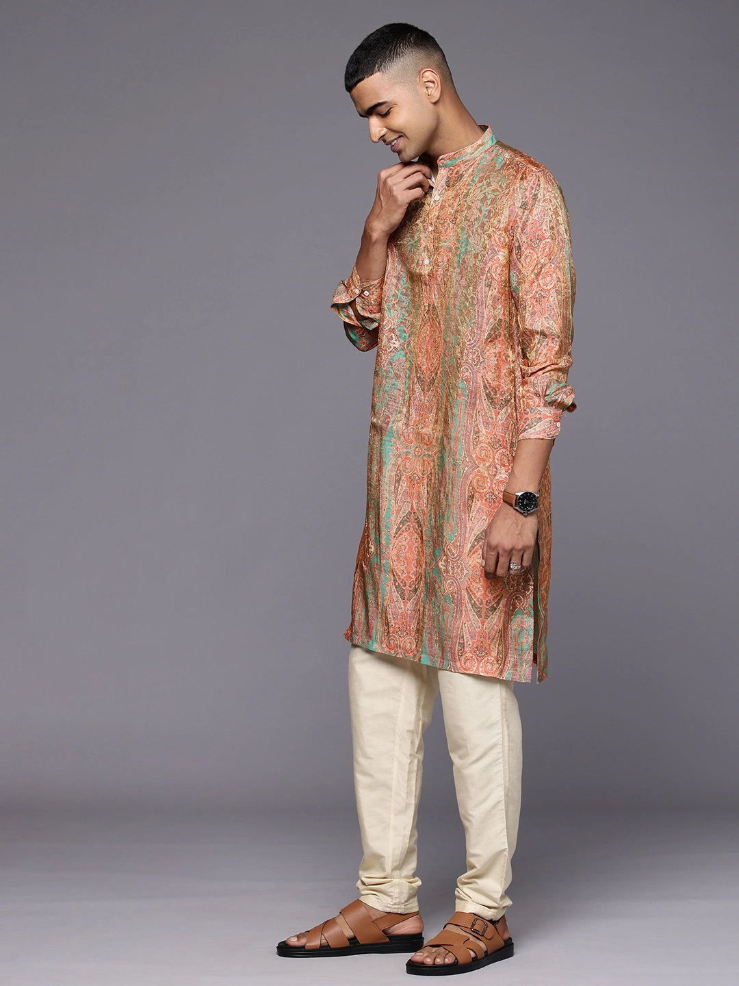 Model Looking sideways wearing Paisely Green Abstract Print Silk Kurta by Brand Patrah
