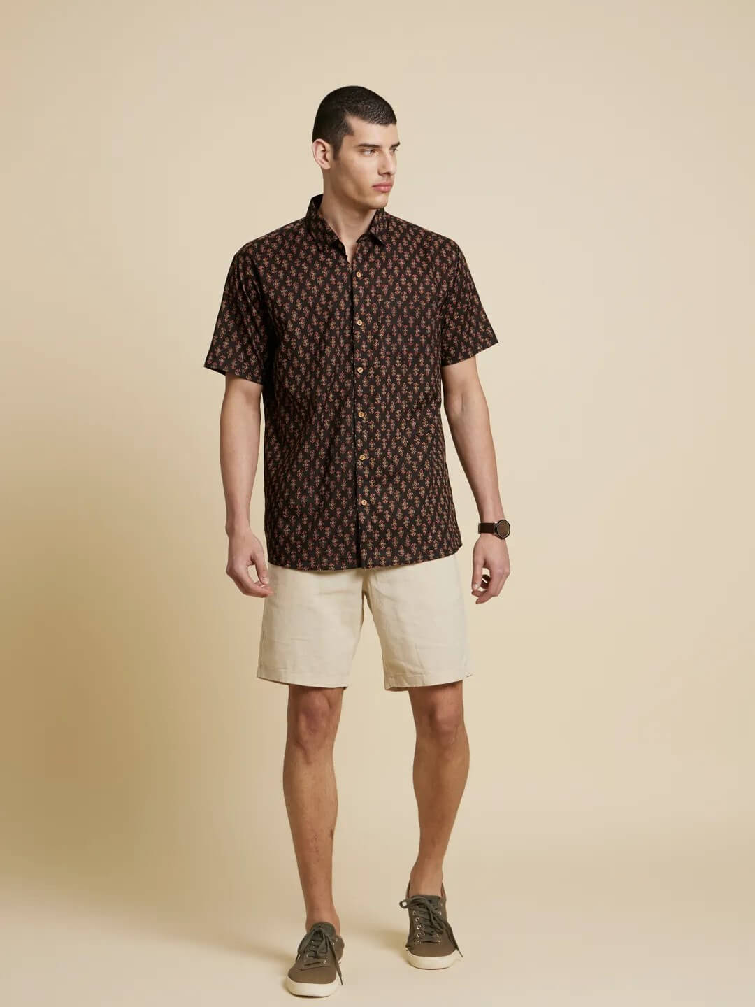 Model Facing sideways wearing Boho Black Printed Shirt by Brand Patrah