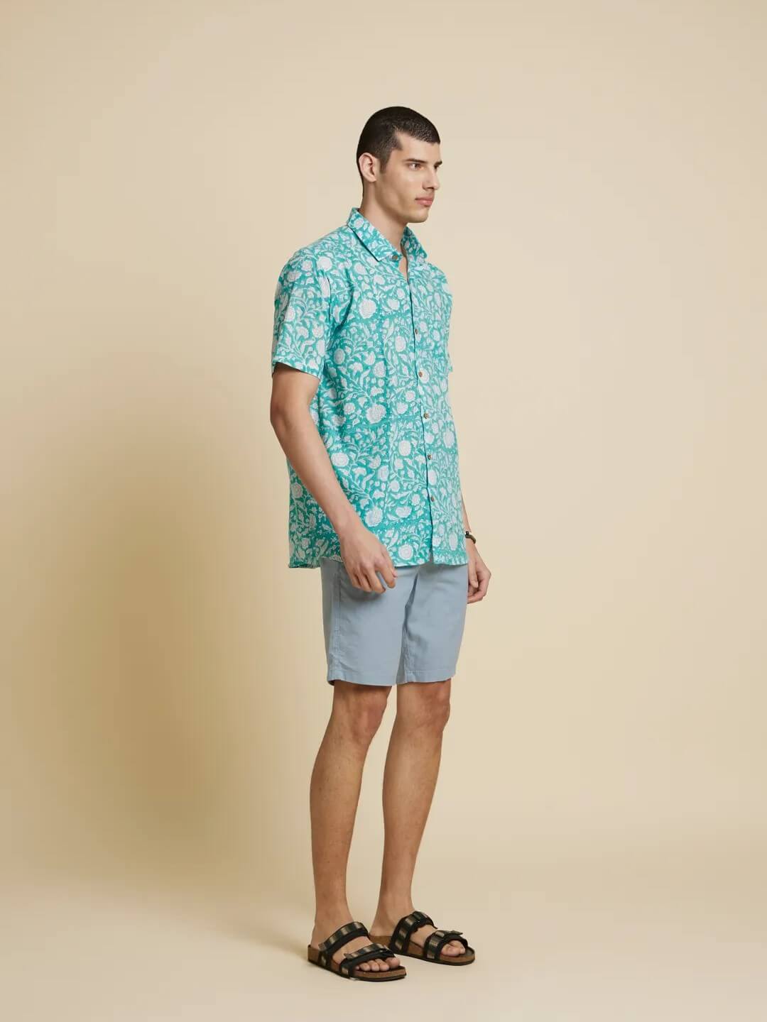Model Facing sideways wearing Botanical Floral Handblock Printed Shirt by Brand Patrah