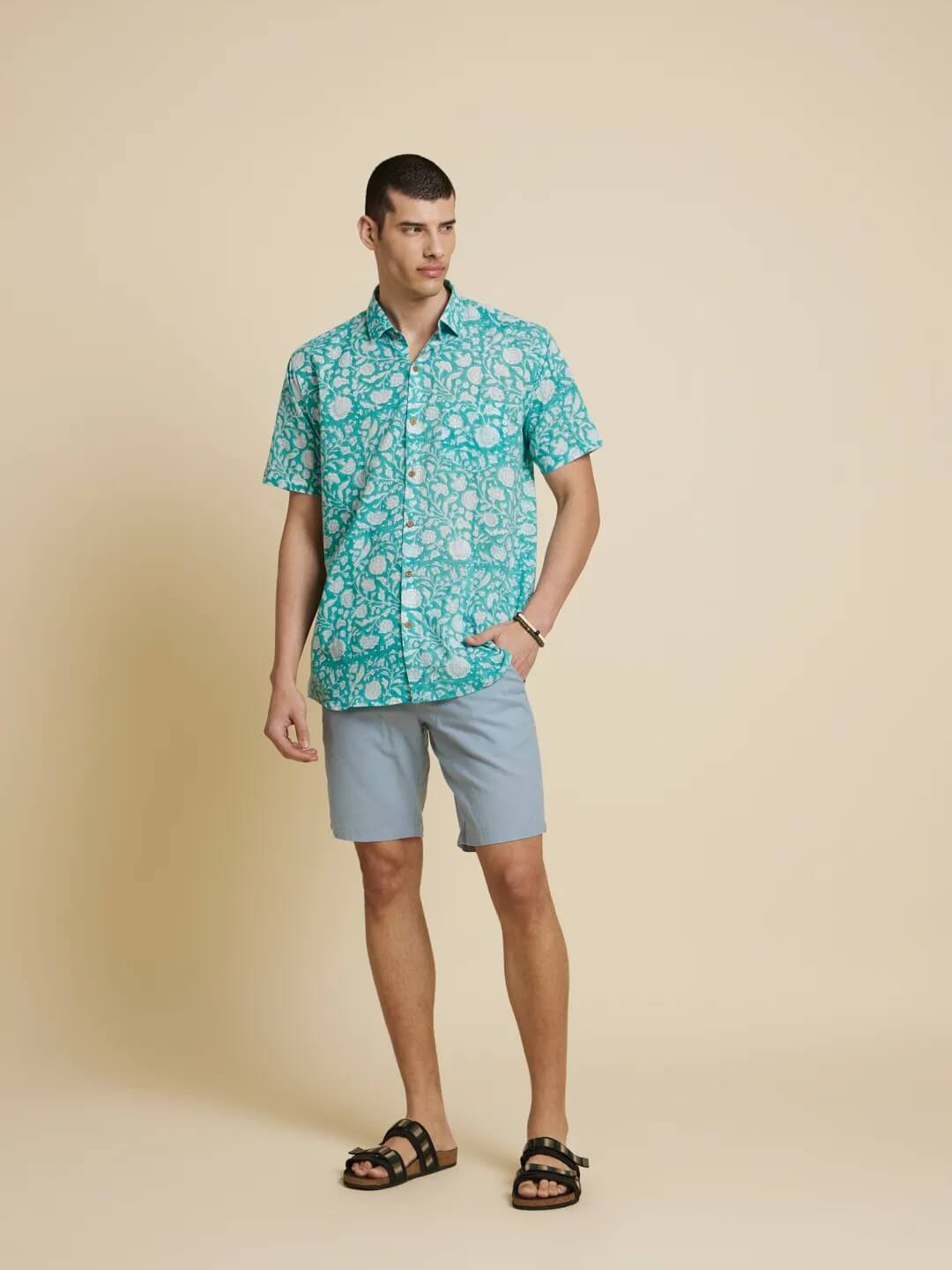 Model Facing sideways wearing Botanical Floral Handblock Printed Shirt by Brand Patrah