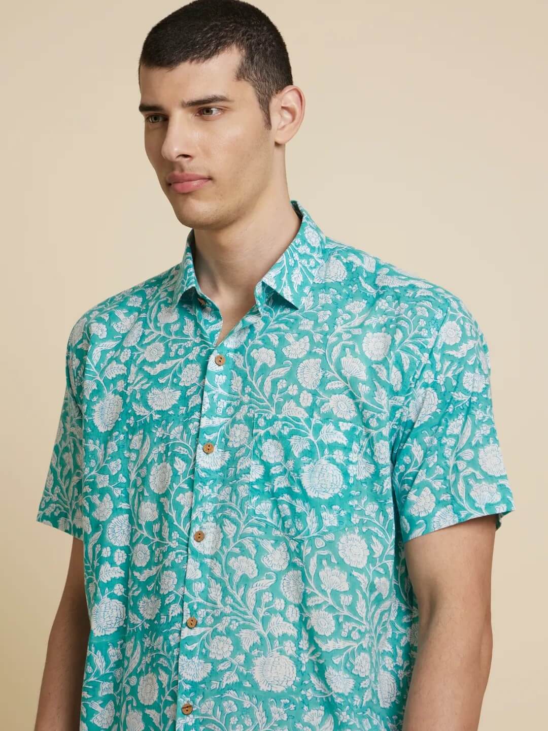 Model Facing sideways wearing Botanical Floral Handblock Printed Shirt by Brand Patrah