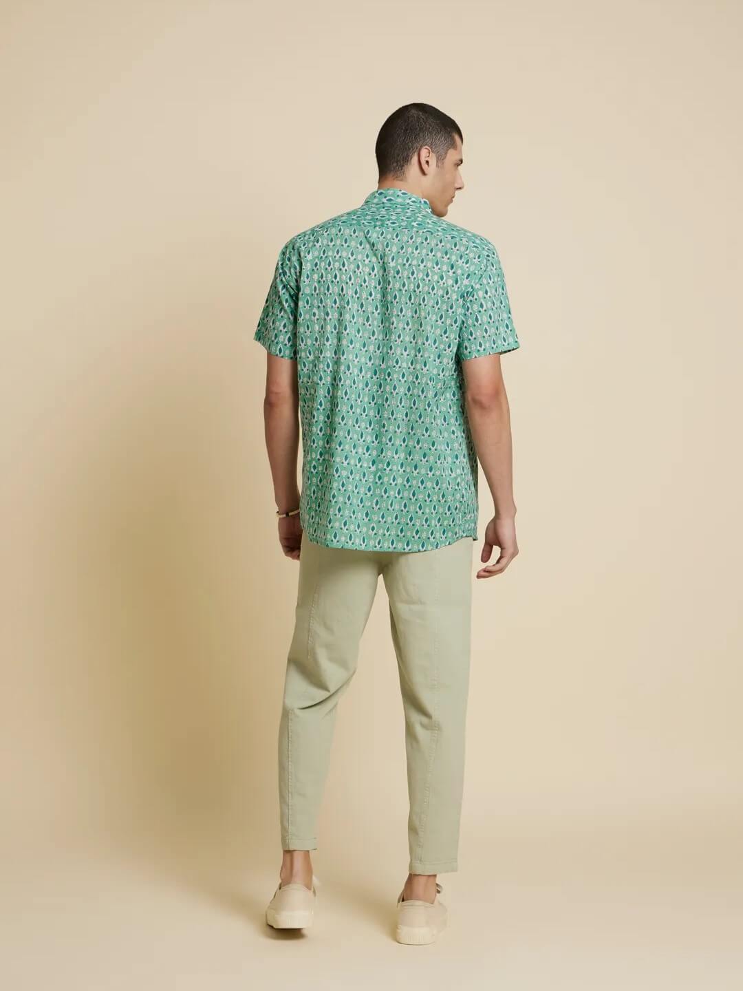 Model facing backwards wearing Holiday Handblock Printed Shirt by Brand Patrah