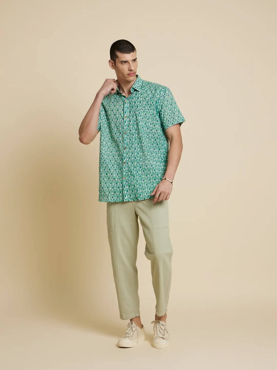 Model Facing sideways wearing Holiday Handblock Printed Shirt by Brand Patrah