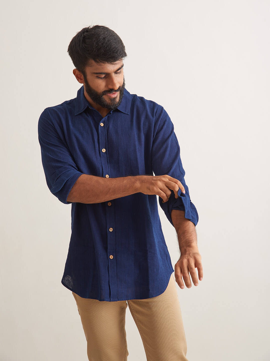 Model Facing sideways wearing Indigo Ocean Handloom shirt by Brand Patrah