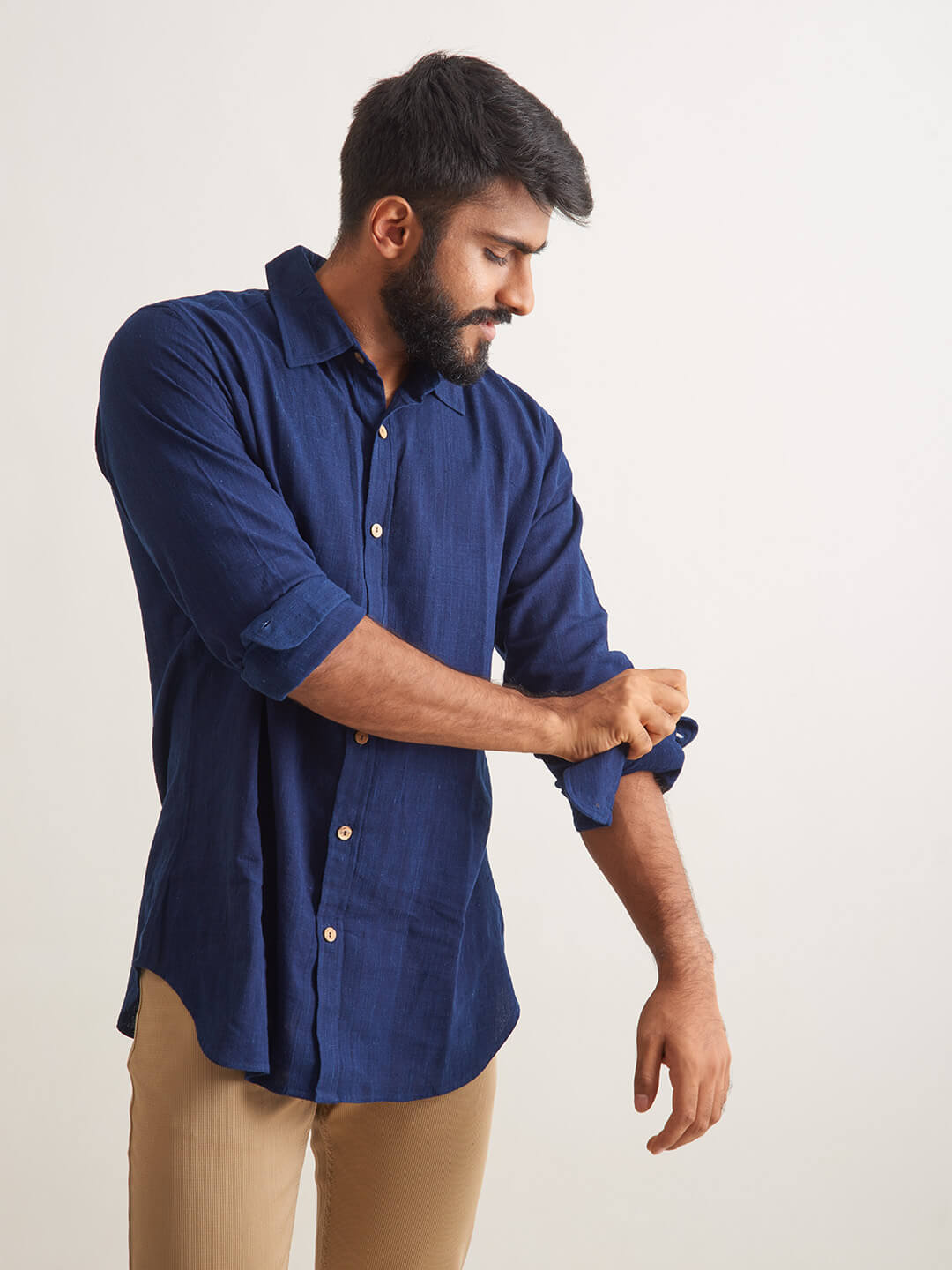 Model Facing sideways wearing Indigo Ocean Handloom shirt by Brand Patrah