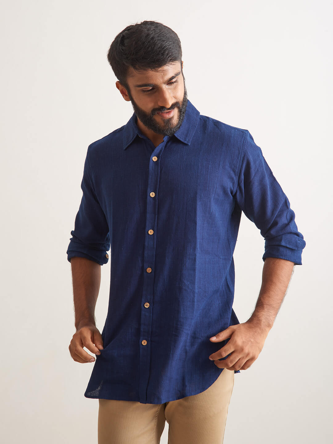 Model Facing sideways wearing Indigo Ocean Handloom shirt by Brand Patrah