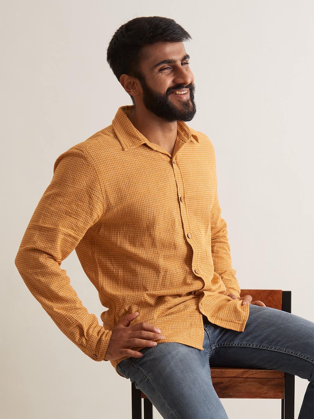 Model Facing sideways wearing Mellow Sunrise shirt by Brand Patrah