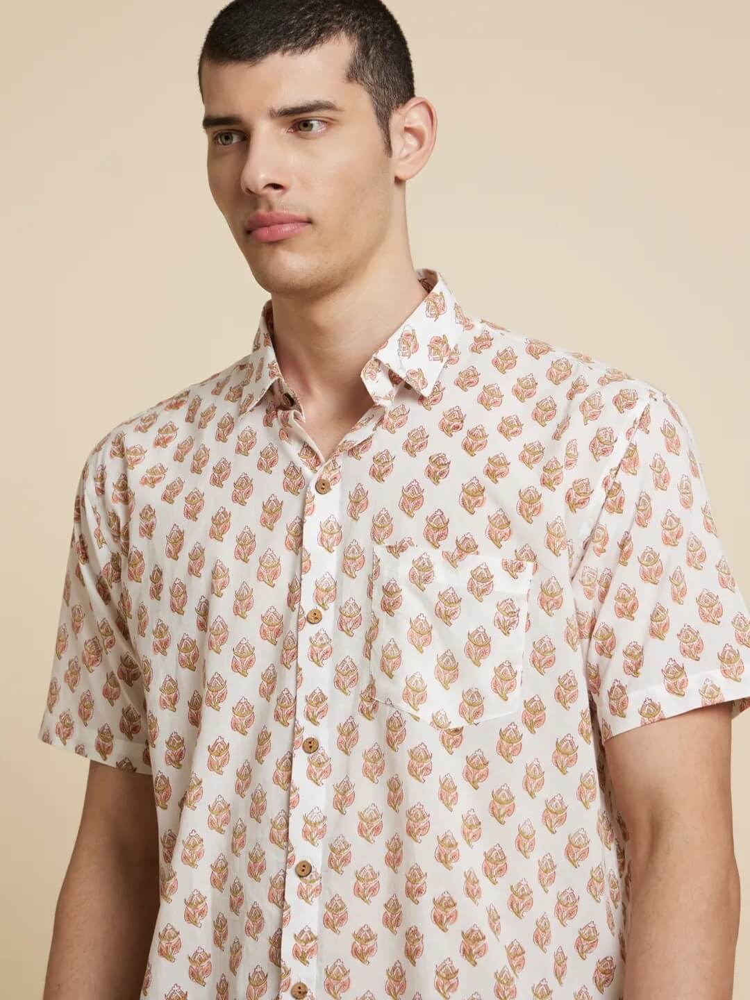 Model Facing sideways wearing White Floral Handblock Printed Shirt by Brand Patrah