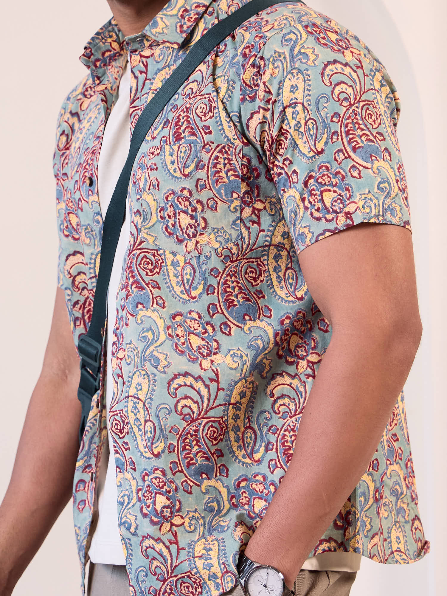 Model wearing a olive colour ethnic, short sleeves casual shirt made of pure cotton fabric