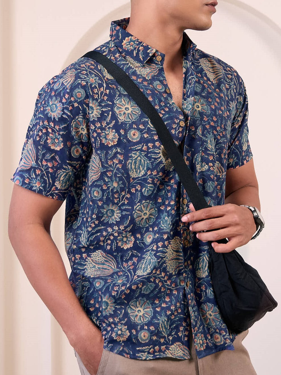 Model wearing a navy blue  colour ethnic, short sleeves casual shirt made of pure cotton fabric