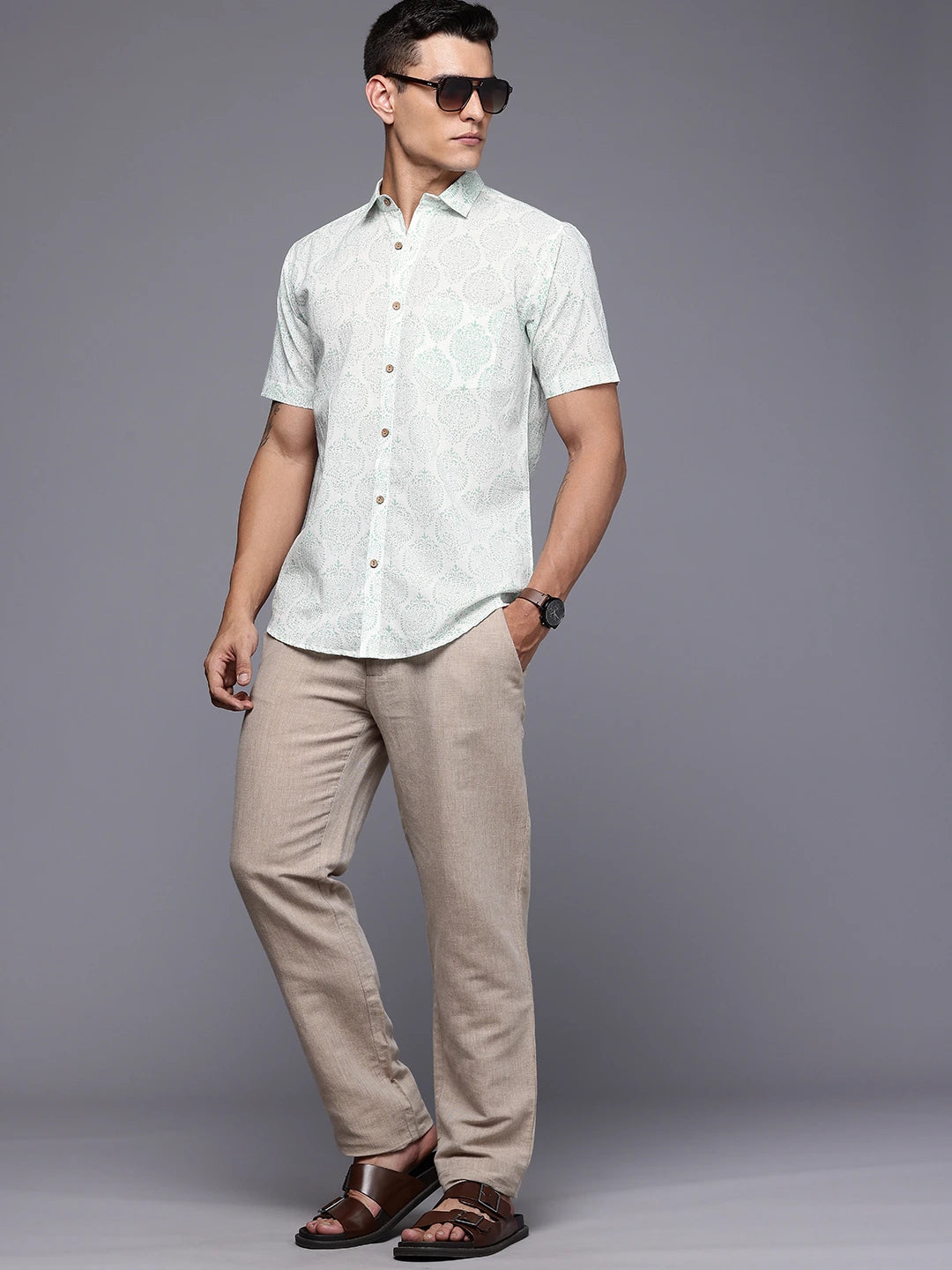 Man wearing a light-colored shirt 